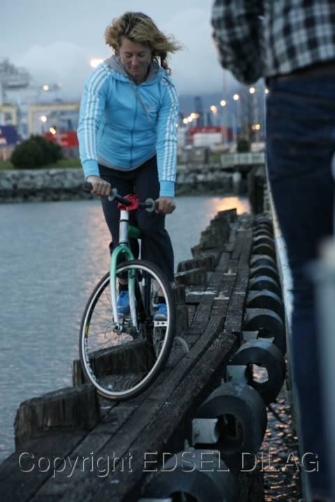 Ines Track Standing on the Edge of a Pier in Oakland
