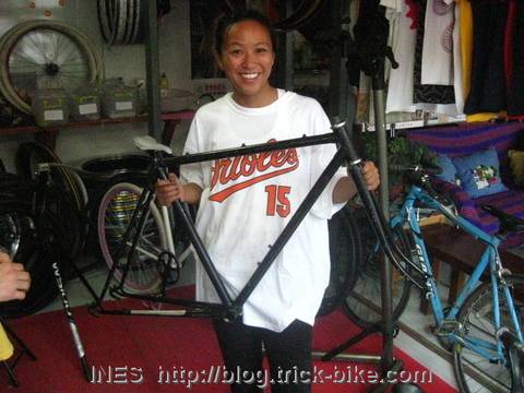 Elaine with her road bike frame